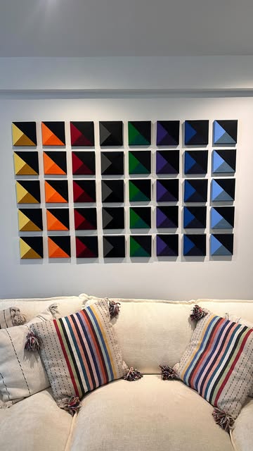 Spectrum Grid installed above a sofa in a living room